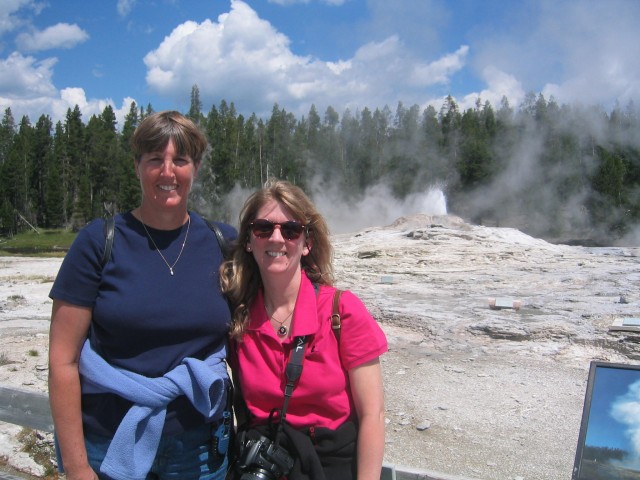 Two geezers in front of a geyser