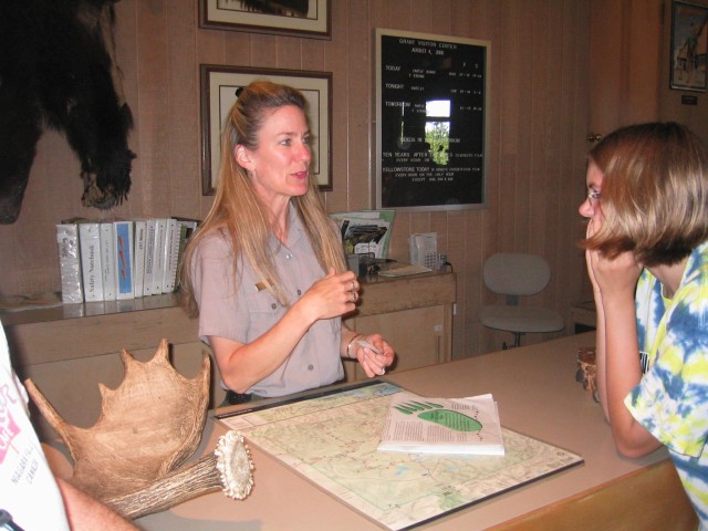 Park Ranger reviewing Janelle's application